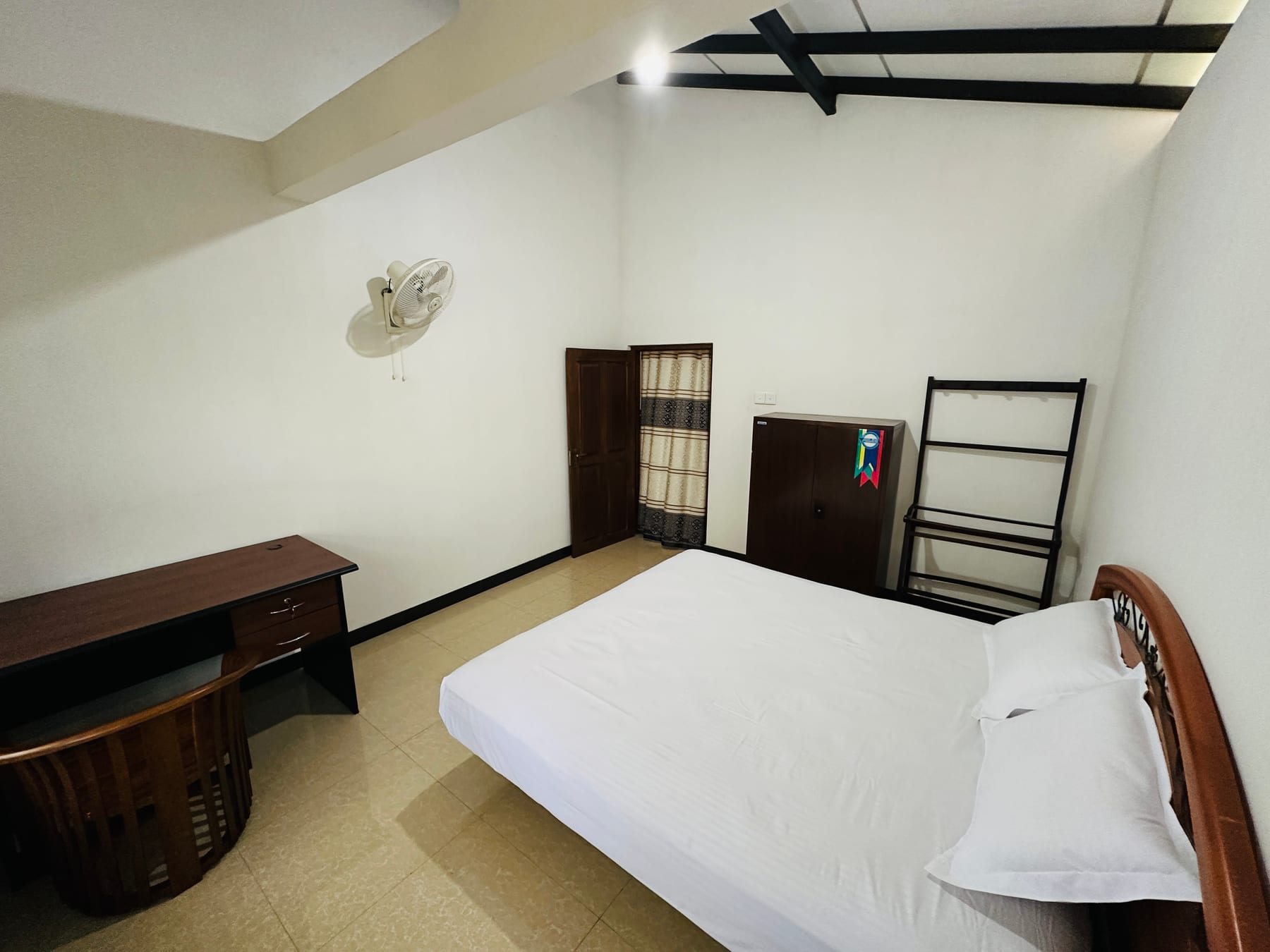 Second double bedroom with desk and timber furniture